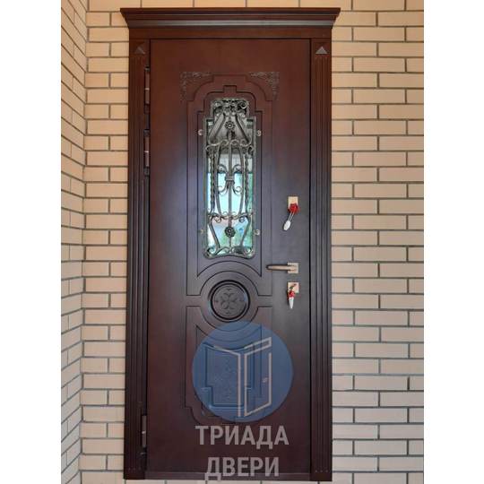 одностворчатая дверь с ковкой для загородного дома - фото 1